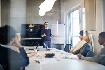 public relations team meeting in office