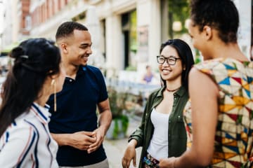 group of bilingual travelers in a foreign country