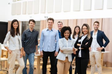 Business people standing and smiling