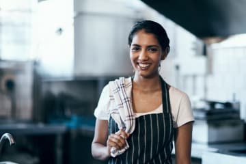 Female restaurant owner in kitchen