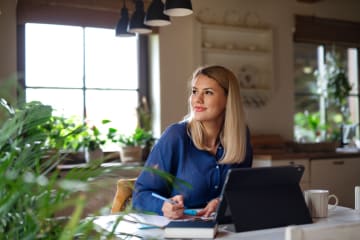 Young woman studying online at home