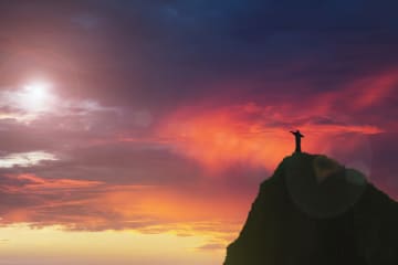 Jesus statue on top of mountain