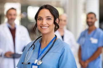 Female DNP student standing in hospital