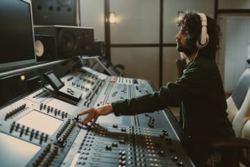 Male working in a music production studio