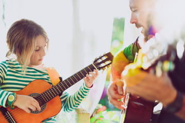 Music therapist teaching student