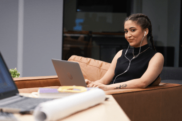 Woman looks at abandon laptop