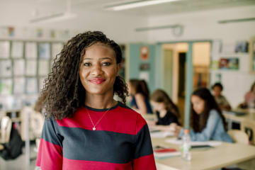 headshot of female teacher in classroom