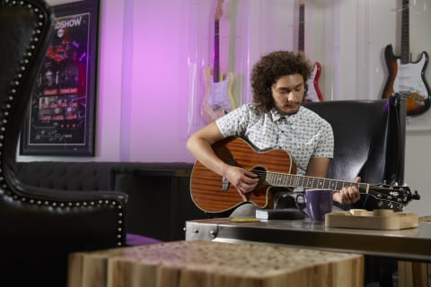 Music Student Playing Guitar