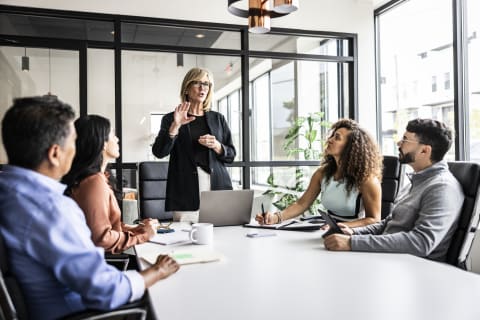People in a meeting talking and collaborating with each other