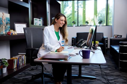 Nursing leader working at desk