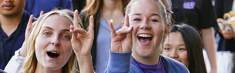 students smiling for camera