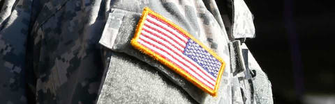 An army veteran wearing camo