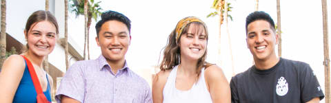 group of students hanging out and smiling