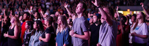 students at monday morning chapel service