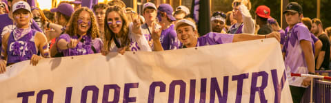 Students tailgating to soccer game