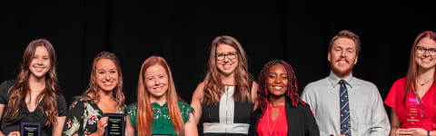 Honors College award winners on stage at Honors College Banquet