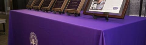 Awards lined up on table for Hall of Fame inductees