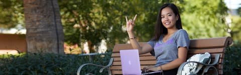 GCU female student outside with Lopes Up