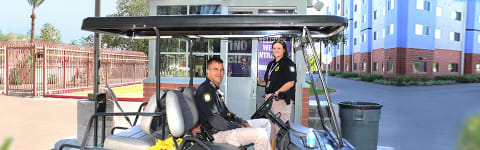 public safety officers at a campus entry gate