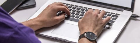 a student using a laptop