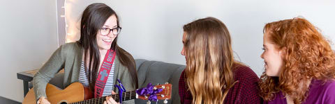 students play worship songs on campus