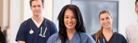 Several nurses smiling at camera