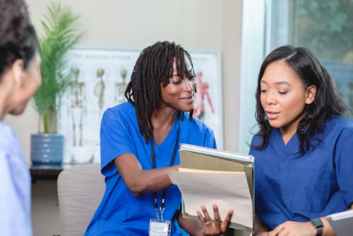 Nurse teaching fellow nurse