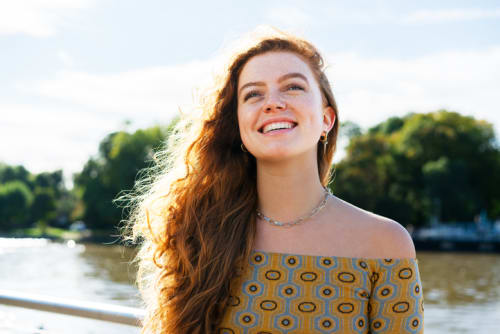 Young woman outside enjoying spring