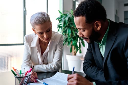 Criminal justice professionals discussing a case