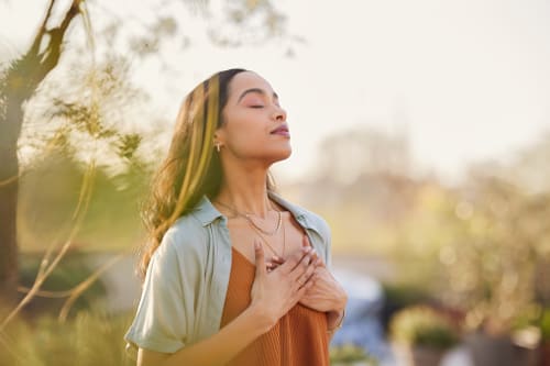 A girl at peace in nature.