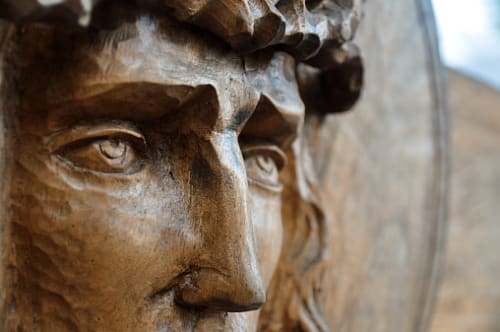 Closeup of a wooden Grecian or Roman statue