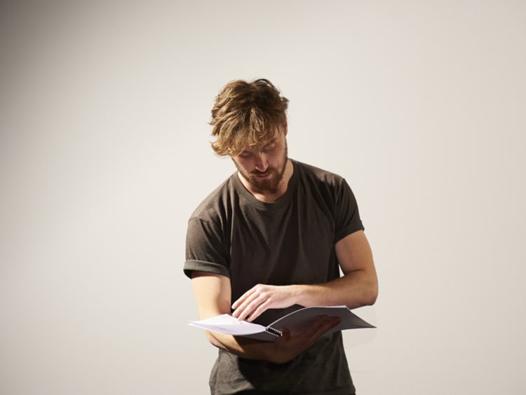 an actor reading a script