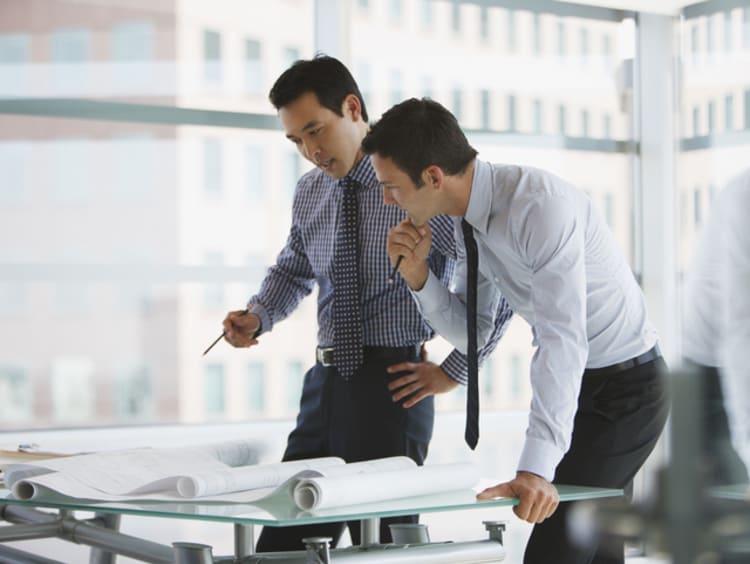 two colleagues working on their decision-making process