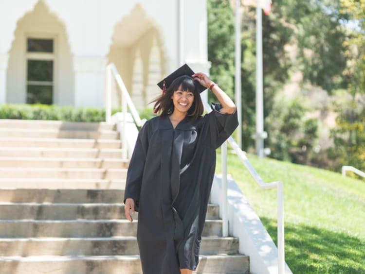 student graduating with associate degree