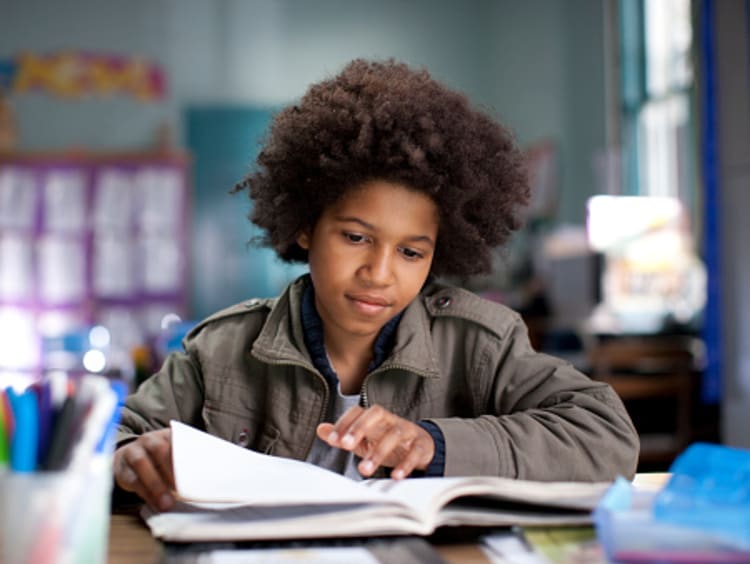 a student reading a book