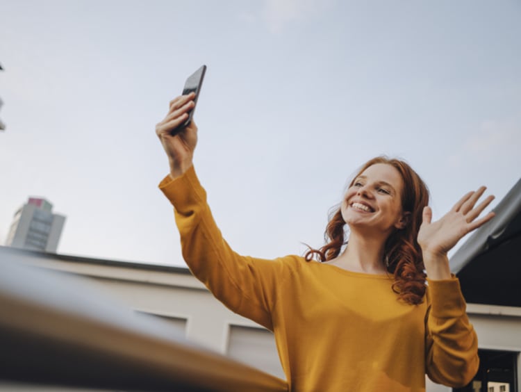 Girl saying hi to her friend over the phone
