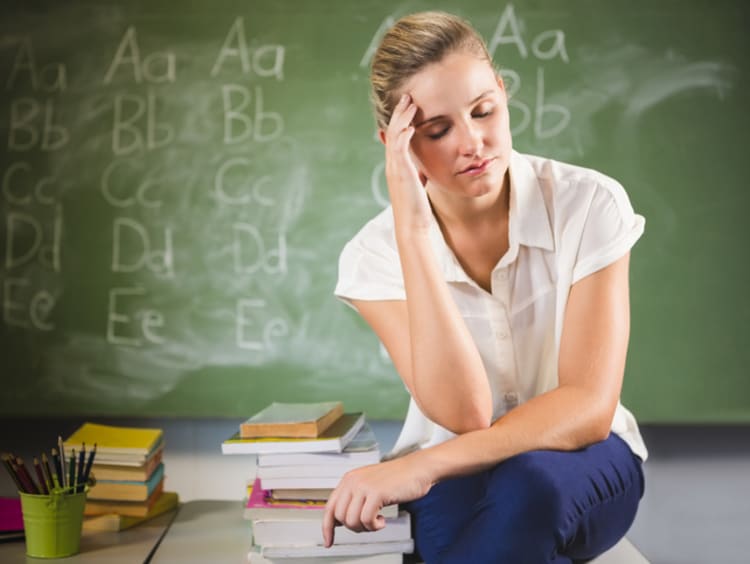 female teacher experiencing compassion fatigue