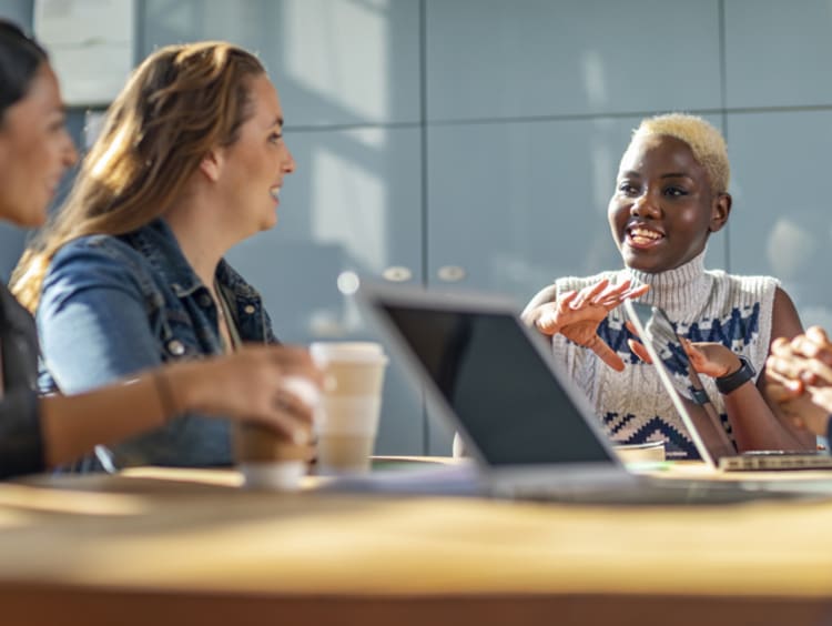 Young professionals engaging in discussion