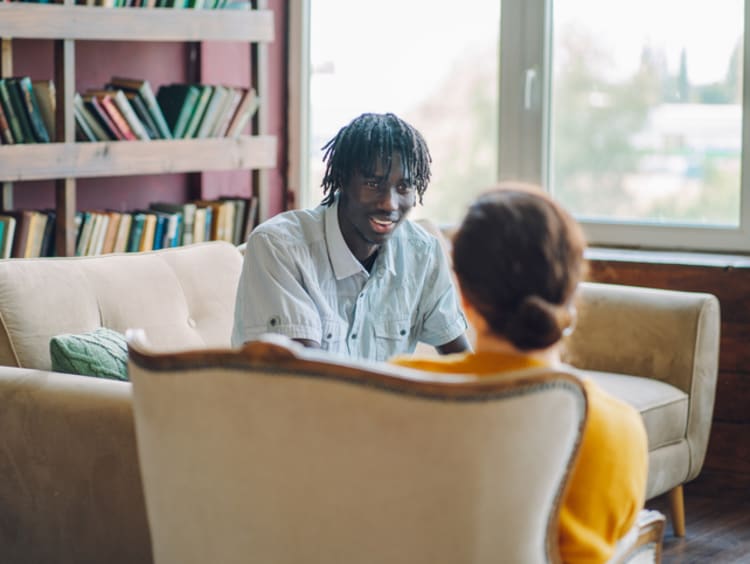 Coaching or therapy session with a young man