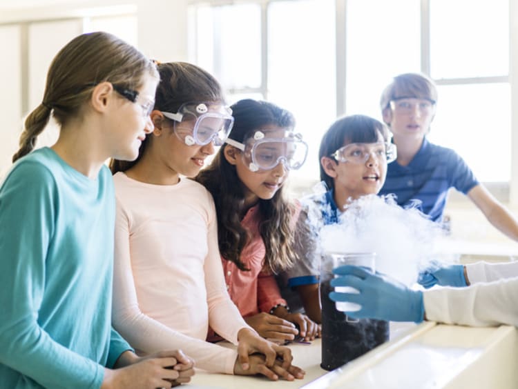 students doing a science experiment in class