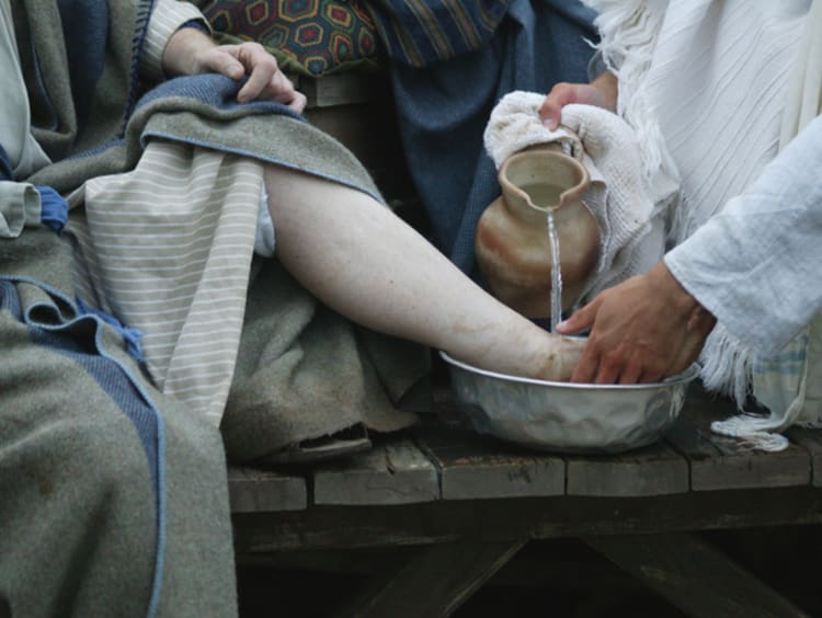 Jesus washes disciples feet - stock photo