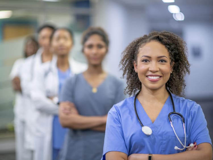 Portrait of all-woman medical team - stock photo