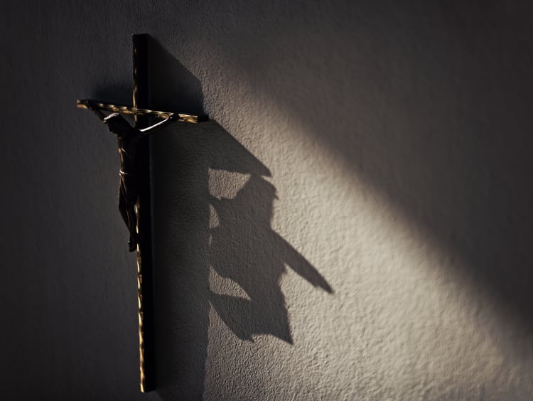 Crucifix on the wall - stock photo