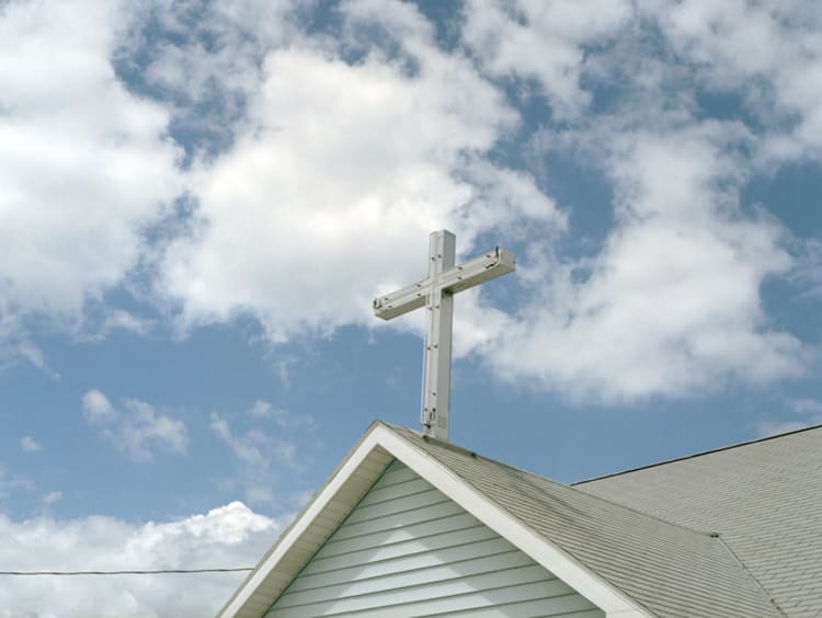 Cross on Top of a Church - stock photo