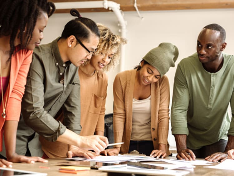 Group of students working on a project together.
