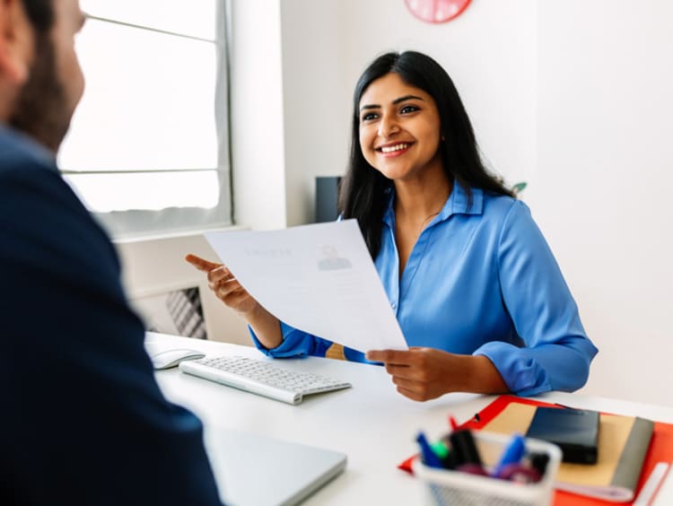 coworkers meeting and working together in an office