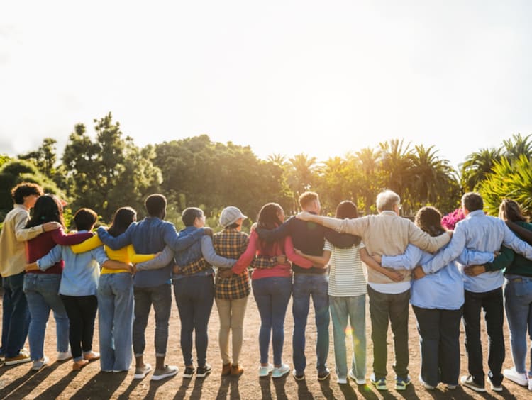 Large group of people embracing in fellowship