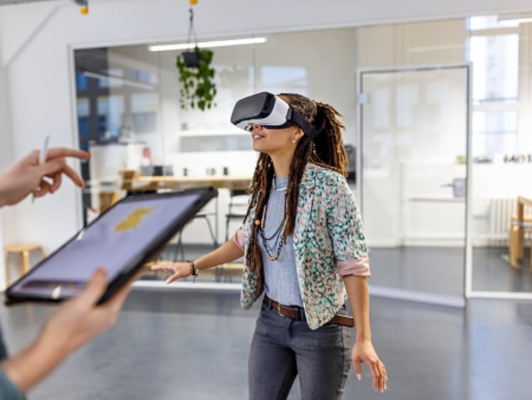 Student testing virtual reality equipment