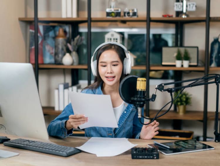 Student using her computer to make new music.
