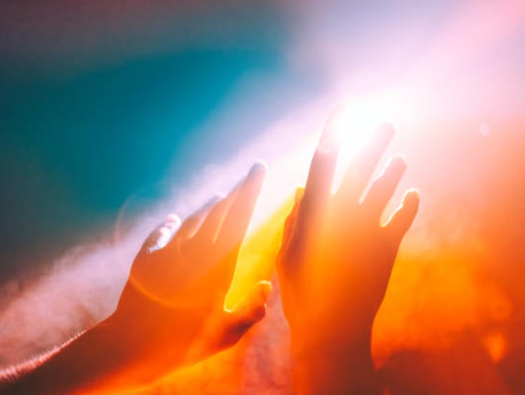 Hands in the sunlight.
